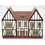 A DOUBLE FRONTED DOLLS HOUSE, HAVING WIRING FOR ELECTRICS, 89CM H; 119 X 44CM