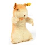 A STEIFF SOFT TOY, 14CM H, TAGGED LABEL TO LEFT EAR
