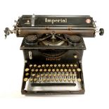 A VINTAGE TYPEWRITER BY THE IMPERIAL TYPEWRITER CO LIMITED LEICESTER ENGLAND, NUMBER I/6982