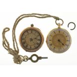 AN ENGINE TURNED GOLD LADY'S WATCH, MARKED 18K, NO 57170, AND A FOLIATE ENGRAVED GOLD LADY'S