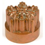 A VICTORIAN COPPER JELLY MOULD OF TURRET DESIGN, 14CM D, STAMPED N49.5½, C1900