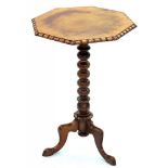 A VICTORIAN CARVED AND TURNED MAHOGANY OCTAGONAL TRIPOD TABLE, 74CM H
