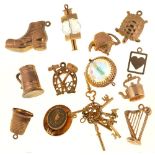 TWELVE 9CT GOLD CHARMS AND A FURTHER GOLD CHARM, UNMARKED, 24G++IN GOOD CONDITION