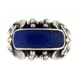 GEORG JENSEN. A LAPIS LAZULI RING IN SILVER, MARKED NO.76, C1930, 12G, SIZE S½++IN GOOD CONDITION,