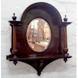 AN INLAID MAHOGANY MIRROR WITH BEVELLED PLATE AND ARCHED TOP, 52 X 45CM