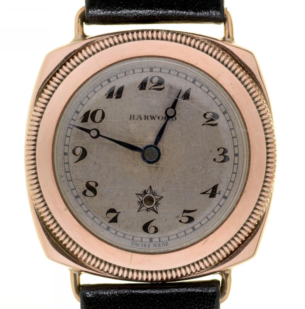 A HARWOOD 9CT GOLD SELF-WINDING LADY'S WRISTWATCH, CUSHION SHAPED, 3 CM EXCLUDING LUGS, LEATHER