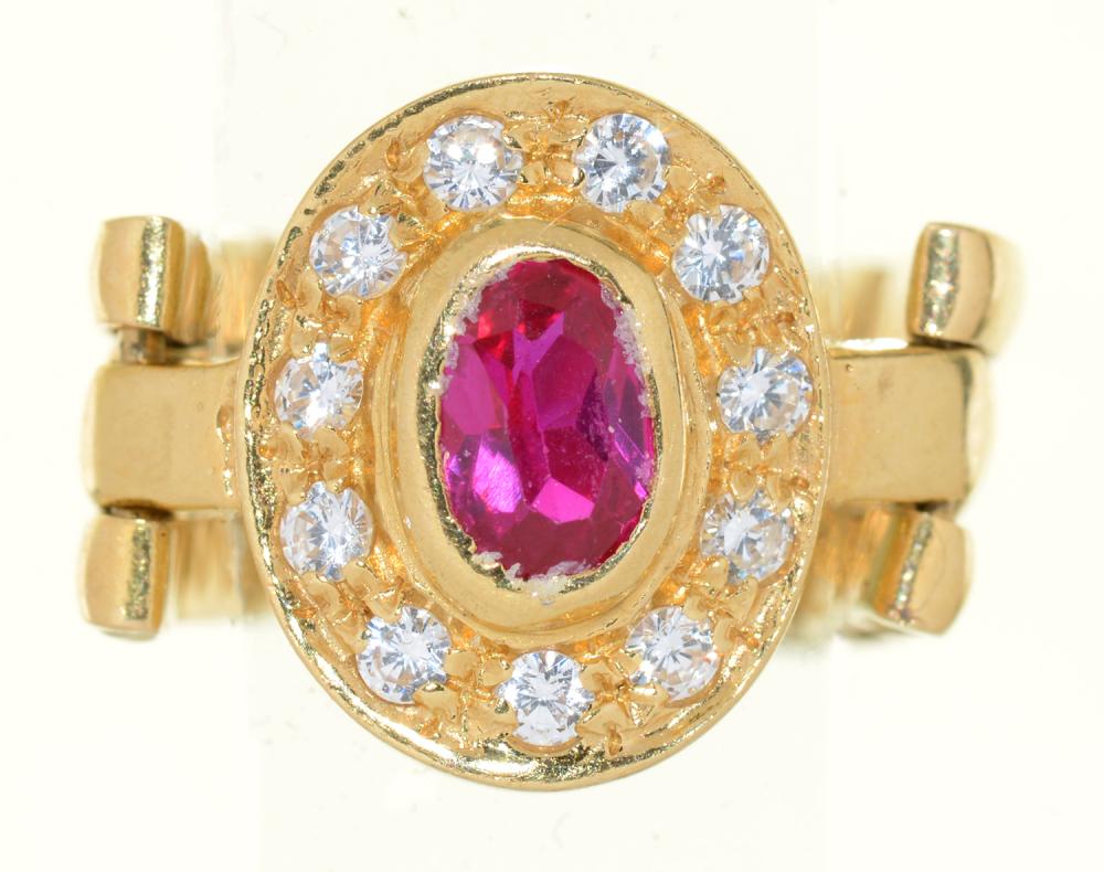 A RUBY AND DIAMOND ARTICULATED RING, IN GOLD MARKED 750, MARK FOR VICENZA, ITALY, 6G, SIZE O++IN