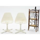 A PAIR OF 1970'S PLASTIC SWIVEL CHAIRS ON CAST ALLOY BASES AND A BAMBOO THREE TIER CORNER WHATNOT