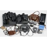 A ZEISS IKON CONTAFLEX 35MM CAMERA, IN LEATHER CASE, A WESTON MASTER LIGHTMETER, TWO PAIRS OF
