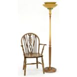 AN ASH WHEEL BACK ELBOW CHAIR AND AN ART DECO STYLE STANDARD LAMP