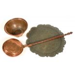 A HEMISPHERICAL COPPER BOWL ON BRASS FOOT, 38CM D, A COPPER WARMING PAN AND AN INDIAN CHASED AND
