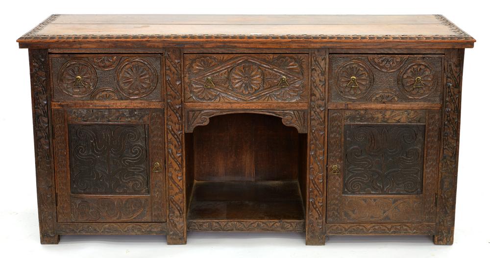 AN ANTIQUE CARVED OAK SIDEBOARD WITH PANELLED DOORS AND BOARDED TOP, ELEMENTS 17TH C, 79CM H; 160