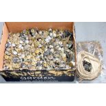 A BOX OF BRITISH BRASS AND OTHER METAL MILITARY AND POLICE BUTTONS, BADGES AND SHOULDER TITLES, ETC,