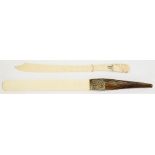 A VICTORAIN SILVER MOUNTED IVORY LETTER KNIFE WITH SPIRALLY REEDED HORN HANDLE, 39CM L, BIRMINGHAM