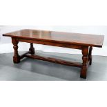 AN OAK REFECTORY TABLE, THE BOARDED TOP WITH CLEATED ENDS, 75CM H; 228 X 91CM