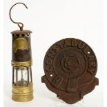 A BRASS AND IRON MINER'S SAFETY LAMP, 25CM H EXCLUDING HOOK AND A CAST IRON ROSE AND GARTER