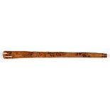 A CARVED AND POLYCHROME DECORATED LONG GOURD, THE BROAD END CRUDELY INCISED FROM LOUIE TULLER AND