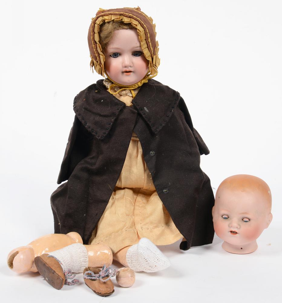 AN ARMAND MARSEILLE BISQUE HEADED CHARACTER DOLL, BENT LIMB COMPOSITION BODY, 43CM H, REQUIRES RE-