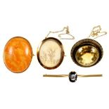 AN AMBER AND GOLD BROOCH, 40 X 33 MM, MARKED 15C, 12G, A GEM SET BAR BROOCH IN GOLD, 64 MM W, MARKED