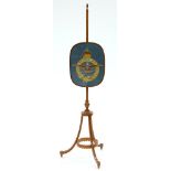 AN EDWARDIAN INLAID SATINWOOD POLE SCREEN, THE WOOLWORK BANNER WITH RAF INSIGNIA, 143CM H