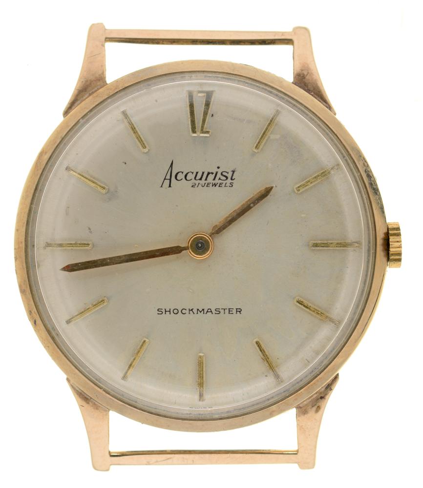 AN ACCURIST 9CT GOLD SHOCKMASTER GENTLEMAN'S WRISTWATCH, CASE 3.2 CM DIAMETER, 18.5G++IN WORKING