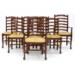 A SET OF EIGHT RUSH SEATED LADDER BACK CHAIRS, INCLUDING TWO ELBOW CHAIRS