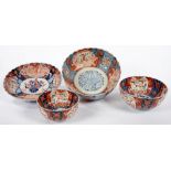 THREE FLUTED JAPANESE IMARI BOWLS AND A DISH, LARGEST BOWL 24.5CM D, EARLY 20TH C