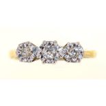 A THREE STONE DIAMOND RING, IN 18CT GOLD, 2.5G, SIZE L++LIGHT WEAR CONSISTENT WITH AGE