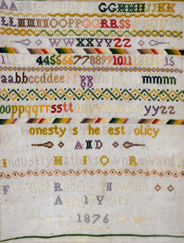 A VICTORIAN LINEN SAMPLER, WORKED BY FLORENCE ROBINSON NEWTON AGED 19 YEARS, 1876, 39 X 30CM AND