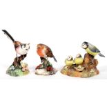 THREE ROYAL CROWN DERBY MODELS OF A LONG TAILED TIT, ROBIN AND BLUE TIT AND CHICK, 12CM H AND