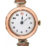 A ROLEX 9CT GOLD CASED LADY'S WRISTWATCH, 27 MM DIAM, IMPORT MARKED LONDON 1912, ON BROWN LEATHER