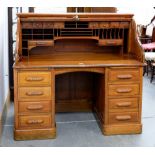 A MAHOGANY PEDESTAL DESK WITH TAMBOUR SHUTTER AND FITTED INTERIOR, EARLY 20TH C, 130CM H; 140 X 82CM