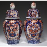 A PAIR OF JAPANESE RIBBED IMARI JARS AND COVERS, MEIJI PERIOD 36cm h++Good condition