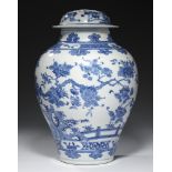 A CHINESE BLUE AND WHITE JAR AND COVER, QING DYNASTY, 19TH C painted with landscape and fence,