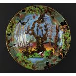 A WEDGWOOD FAIRYLAND LUSTRE ROUND DISH DESIGNED BY DAISY MAKEIG-JONES, C1920 decorated with the