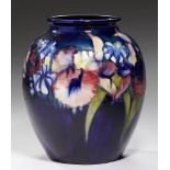 A MOORCROFT ORCHID VASE, C1947-50 27cm h, impressed marks, painted signature++Good conditioin