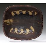 A STAFFORDSHIRE SLIPWARE BAKING DISH, LATE 18TH C decorated in yellow ochre slip with three lines