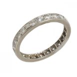 A BRILLIANT CUT DIAMOND ETERNITY RING the diamonds approx 0.8 ct, in platinum, 3.5g, size P++