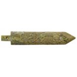 A CHINESE RITUAL JADE GE BLADE carved to both sides in shallow relief with a dragon, taotie at the