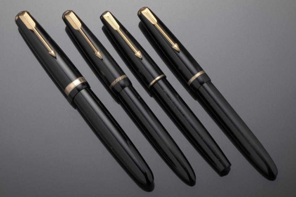 FOUR PARKER BLACK FOUNTAIN PENS comprising Duofold, "17" Lady and two Slimfold and a Parker box