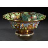 A WEDGWOOD FAIRYLAND LUSTRE DAVENTRY BOWL DESIGNED BY DAISY MAKEIG-JONES, C1920 decorated to the