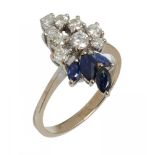 A SAPPHIRE AND DIAMOND CLUSTER RING the brilliant cut diamonds approx 0.4 ct, in gold marked 18ct,