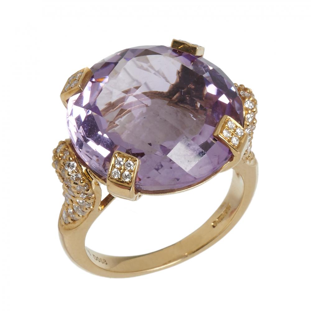 AN AMETHYST AND DIAMOND COCKTAIL RING with diamond set claws, in 18ct gold, 9.5g, size N++In good