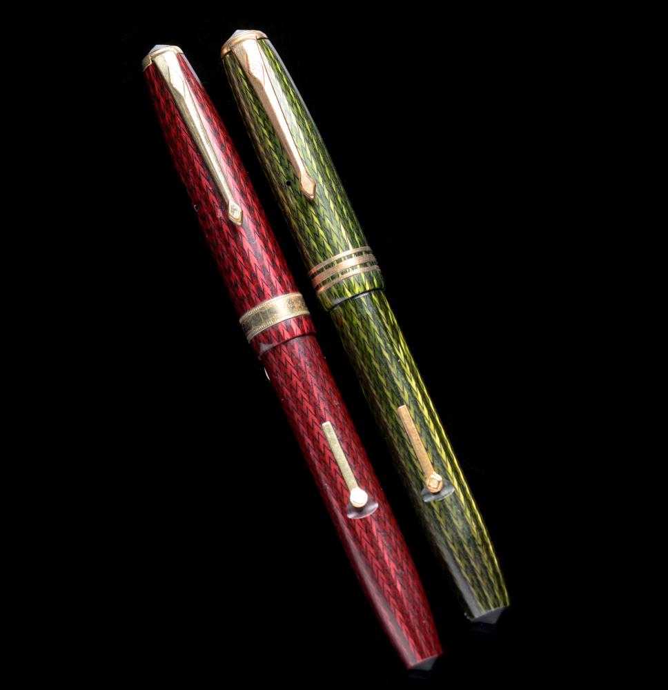 TWO CONWAY STEWART FOUNTAIN PENS, 58 AND 76 green and red herringbone respectively++As found