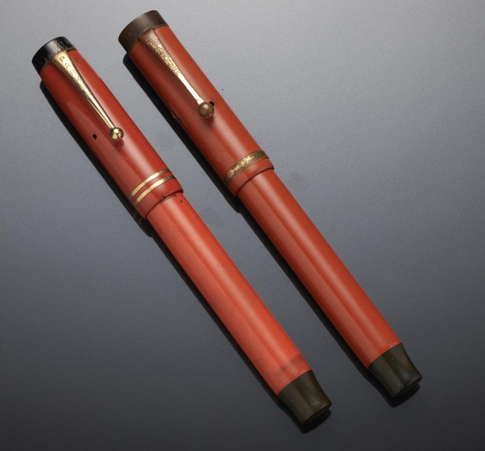 TWO PARKER BIG RED FOUNTAIN PENS, DUOFOLD one inscribed SIR MALCOLM WATSON++Both in as found