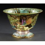 A WEDGWOOD FAIRYLAND LUSTRE ANTIQUE CENTRE BOWL DESIGNED BY DAISY MAKEIG-JONES, C1920 the exterior