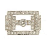 AN ART DECO OLD CUT DIAMOND BROOCH, C1930 the principal diamond approx 0.85 ct, the additional melee