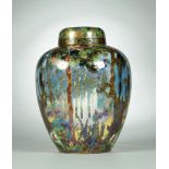 A WEDGWOOD FAIRYLAND LUSTRE MALFREY POT AND COVER DESIGNED BY DAISY MAKEIG-JONES, C1920 decorated