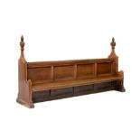 A VICTORIAN GOTHIC OAK BENCH, C1856-1878 with carved poppy-heads, 152cm h; 67 x 287cmProvenance: