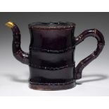 A CHINESE AUBERGINE GLAZED BAMBOO FORM WINE POT, QING DYNASTY 13cm h, Kangxi periodProvenance: